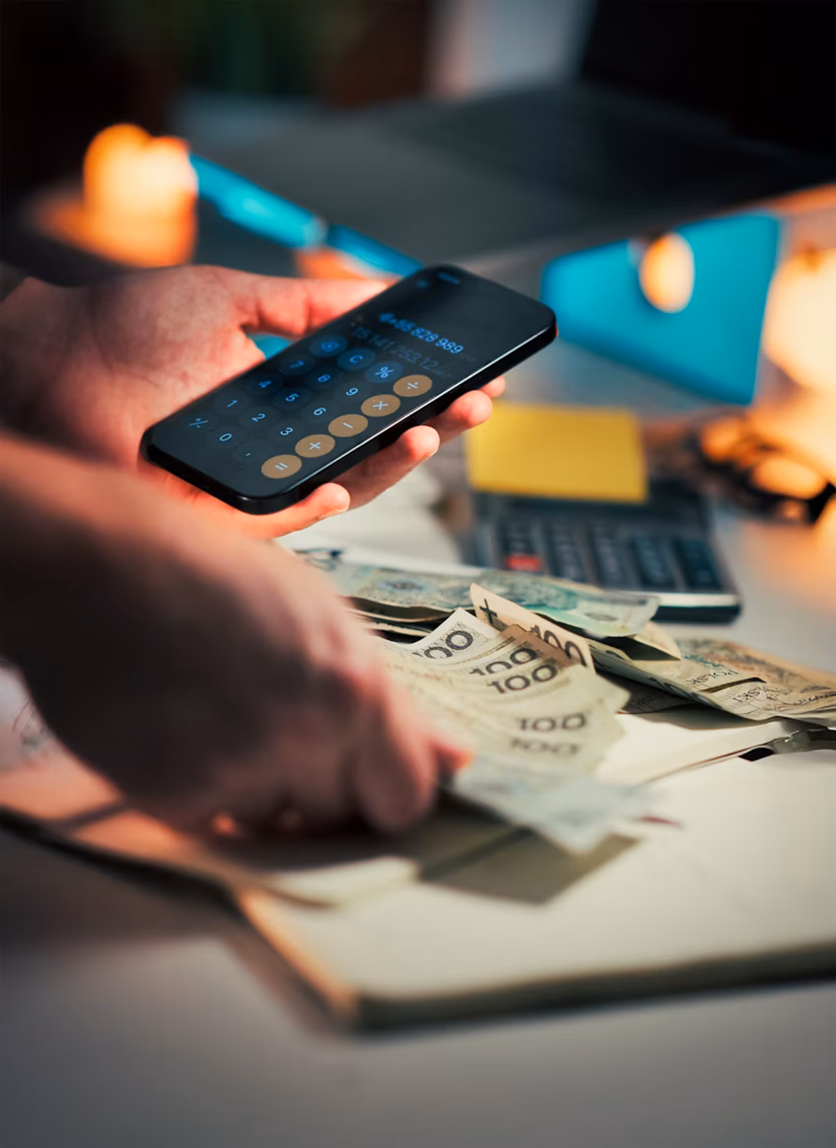 A smartphone displaying a debt payoff progress chart on a clean desk