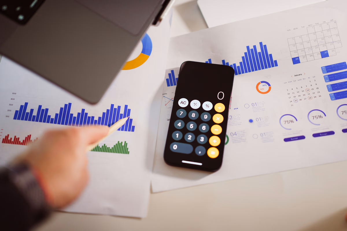 A smartphone displaying a finance app on a dark background